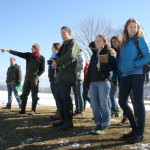 Topher Sabot '99 surveys the pastures with students.