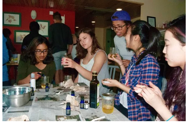 Students in the natural-lotion making workshop