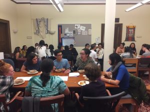 Students discuss religion and colonialism at the Interfaith/VISTA dinner.