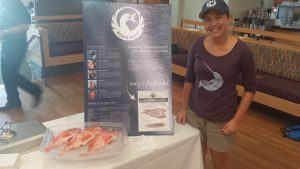 Erica Chang & a Red's Best sustainable seafood display