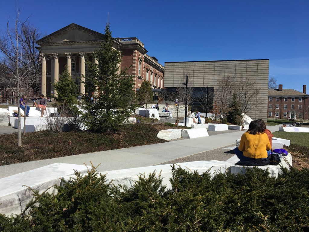 A view towards Chapin Hall over landscaped areas at the top of Library Quad.