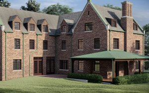 Image of three-story brick building with green trim