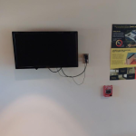 Image of blank TV screen mounted on wall
