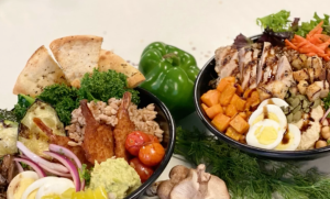 Fresh looking grain bowls filled with veggies and protein