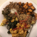 Plate full of plant-based food, including sweet potatoes, noodles, mushrooms, and barley