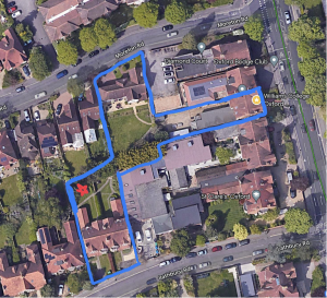 Satellite map outlining the property - garden location marked by a red star in the back of the property