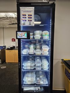 Vending machine of sandwiches, salads, and fruit in the first floor of Sawyer.