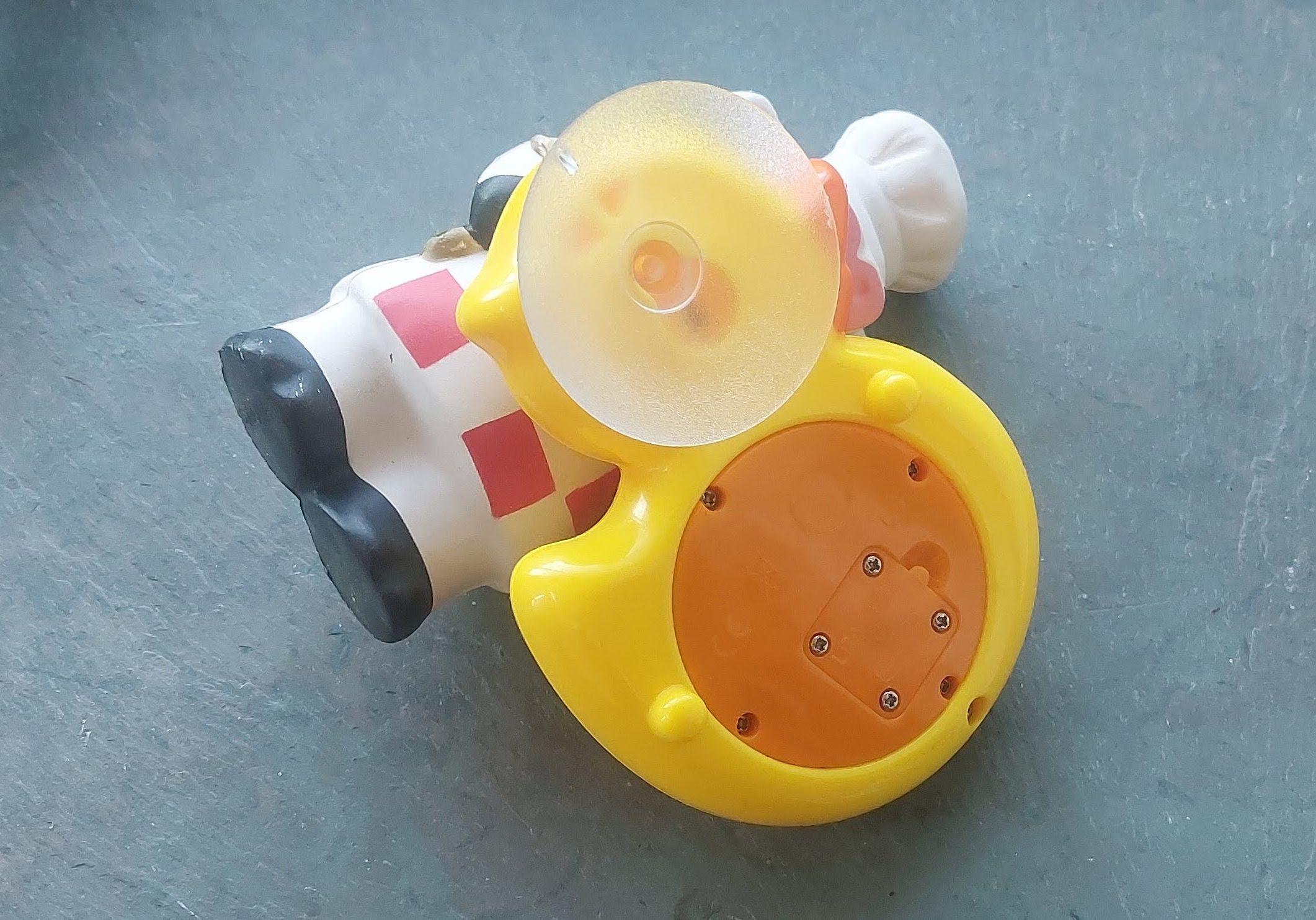 Two cheap plastic-y swag items.